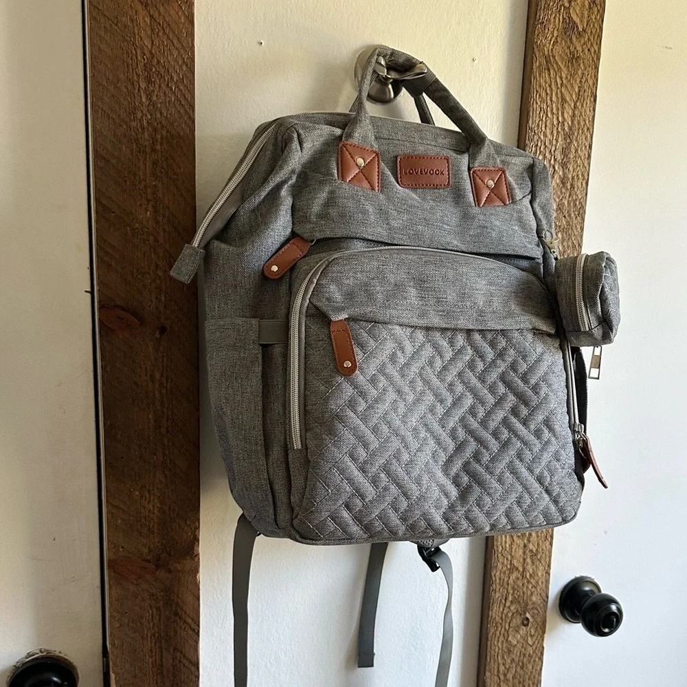 Boutique Large Diaper Bag, Backpack, Bassinet, Tech Charging Station all in one